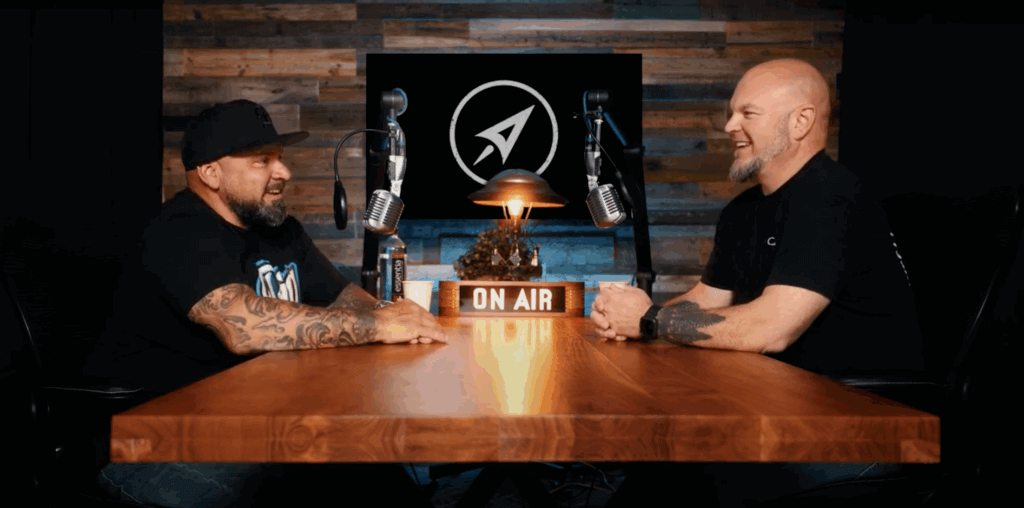 Conversation between an entrepreneur and podcast host discussing business coaching strategies.